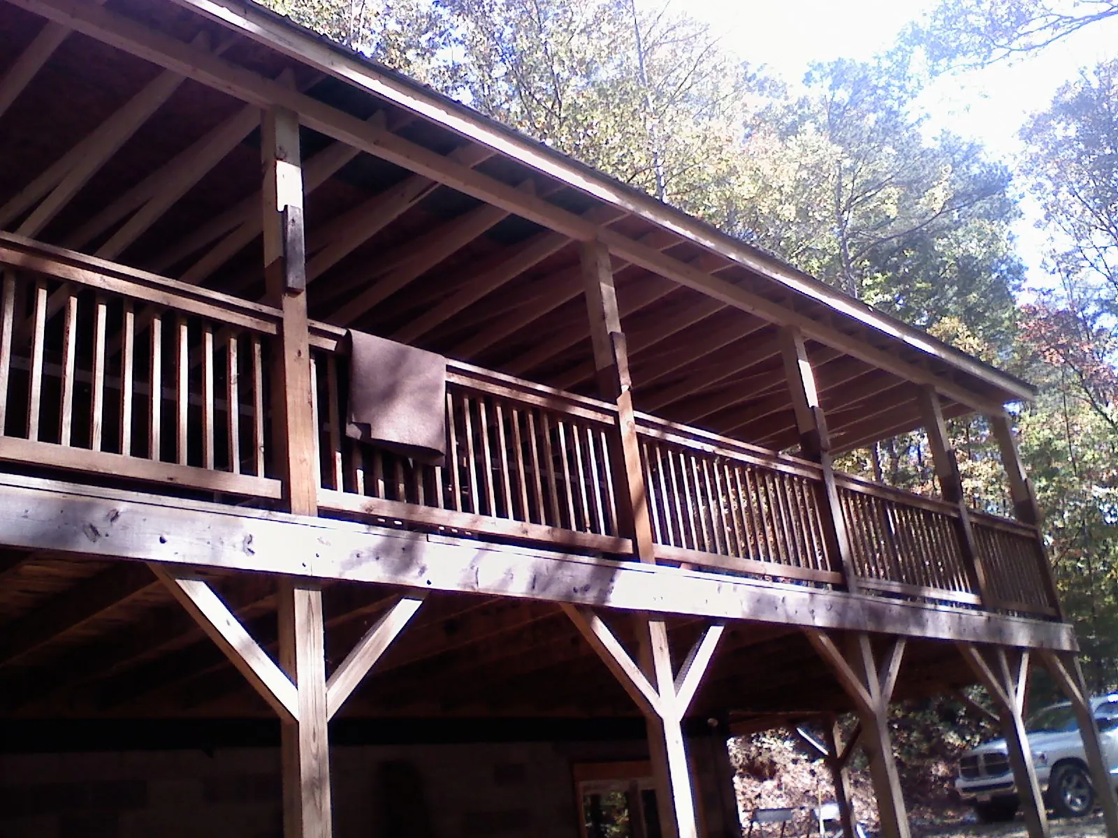 Timber framing under a new elevated porch and deck — Roof Leak Repair in Whitesburg by Roofing Brothers